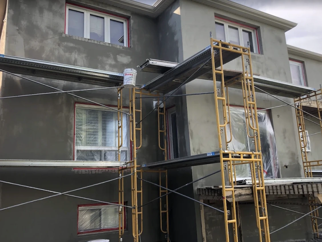 Signs of stucco damage requiring repair